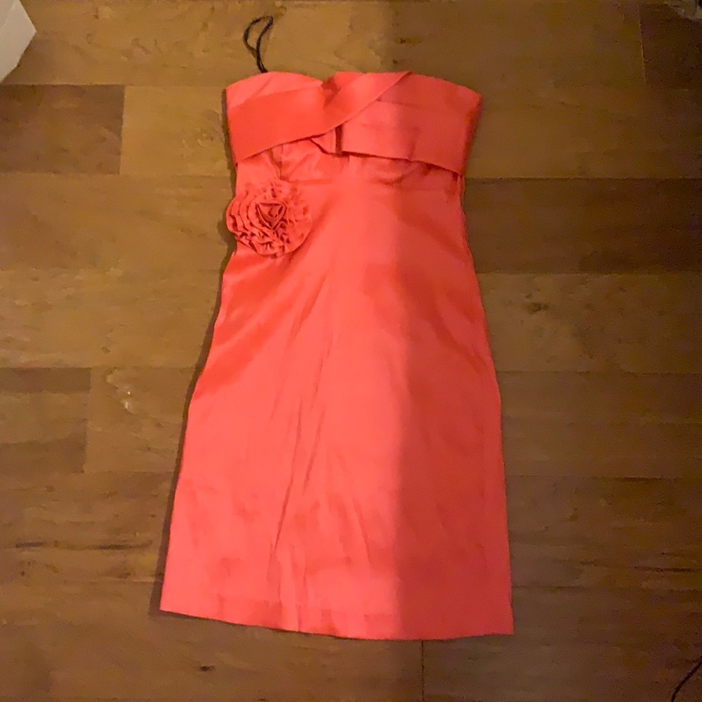 Pink coral dress with flower design on waist area